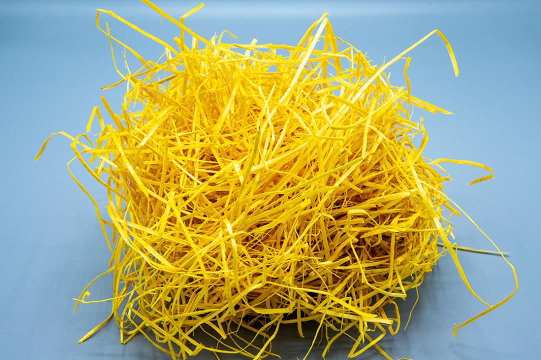 umweltfreundliches Polstermaterial aus Holzwolle Gelb